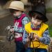 Ilustrācija: camera, rain, street, wet, weather, boy, nature, kids, umbrella, kid, child, hat, city, model, smile