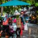 Ilustrācija: man, cart, street food, culture, nature, rain, umbrella, puddle, weather, wet, city